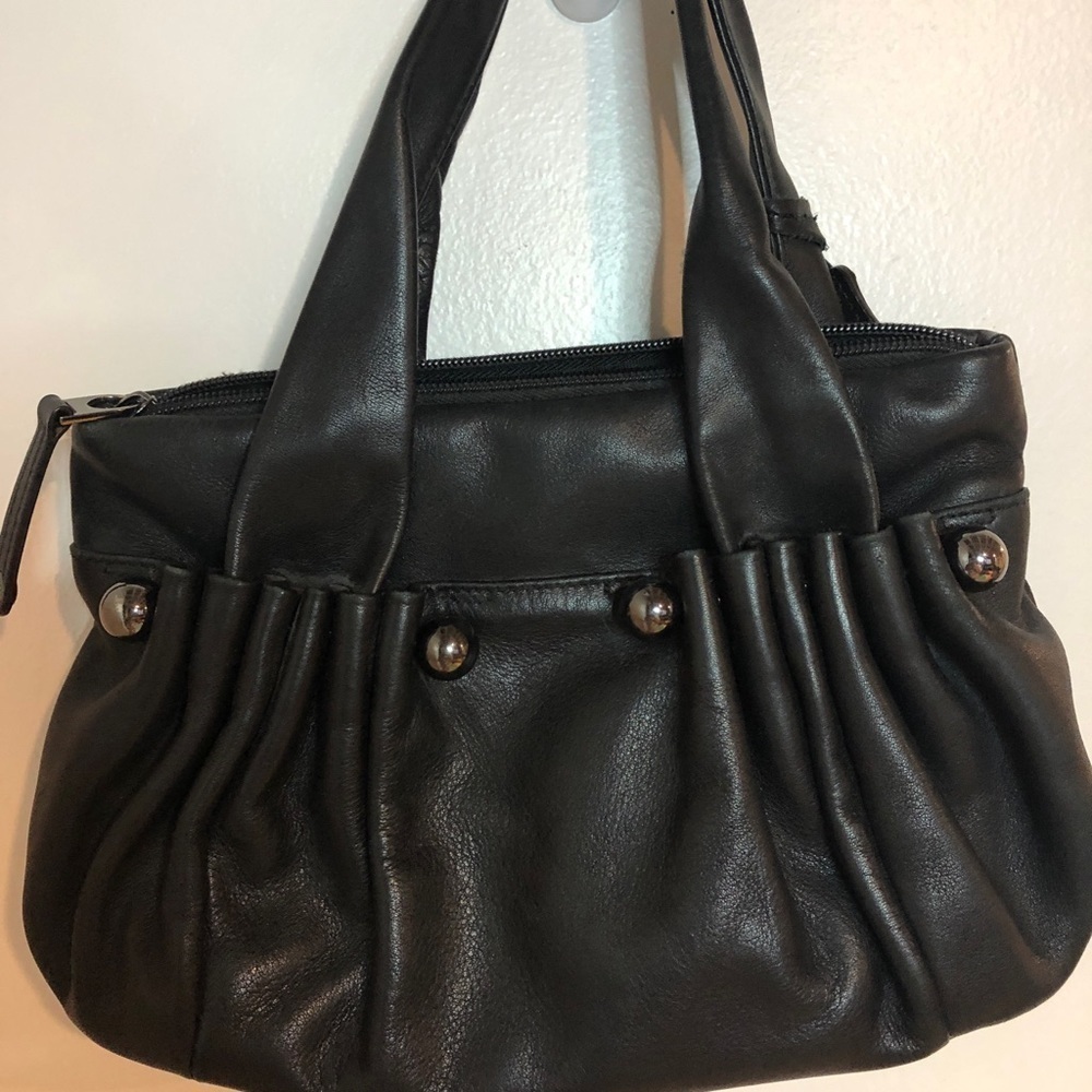 - Black leather Wanlima purse, beautiful soft leather with heavy hardware.